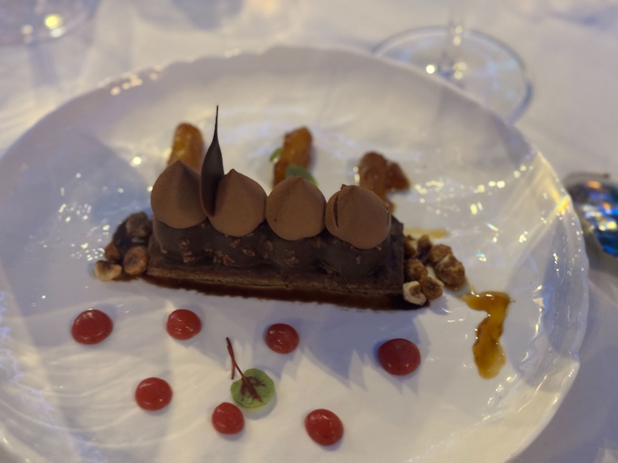 Plated chocolate dessert course at a formal dinner