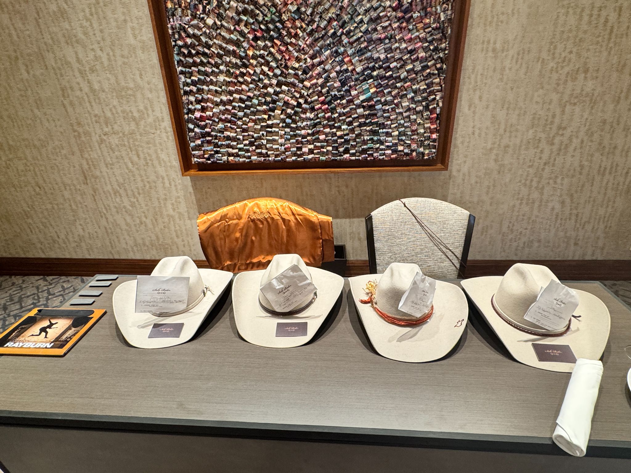 Custom hat bar display at a luxury annual meeting